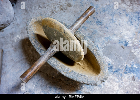 Stone grinder for processing herbs in a Chinese herbal medicine store, Zhuge Bagua Village, Jinhua, Zhejiang Province, China Stock Photo