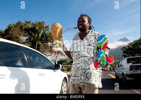Street vendor sells a handcrafted world cup trophy made from wire and glass beads, Cape Town, South Africa Stock Photo