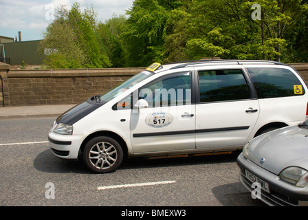 Taxi on the road in Huddersfield. Stock Photo