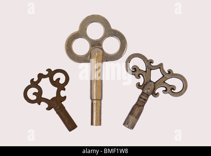 3 three antique ornate clock keys