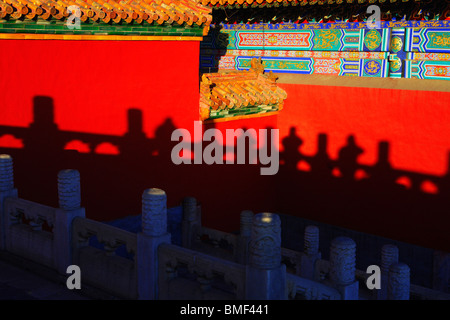Shadow of marble railing on red palace wall, Forbidden City, Beijing, China Stock Photo