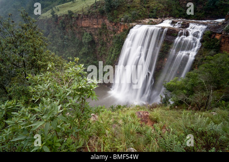 Wide angle view of the cascading Lisbon Falls in the Ukhahlamba-Drakensberg National Park of South Africa Stock Photo