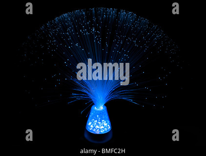 Blue fibre optic lamp against black background Stock Photo