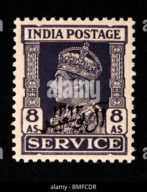 Postage stamp from India depicting King George VI of Great Britain, overprinted for use in Oman (Muscat). Stock Photo