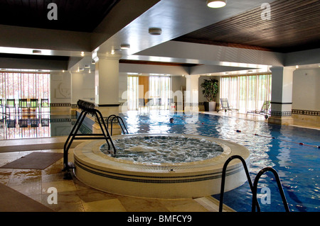 Indoor pool and Jaccuzzi, The Spa, The Runnymede-on-Thames Hotel, Runnymede, Surrey, England, United Kingdom Stock Photo