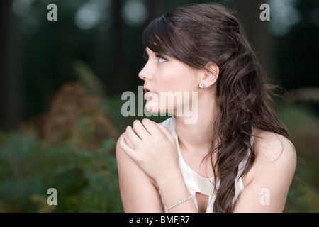 Shot of a Beautiful Teenage Girl in the Forest Stock Photo