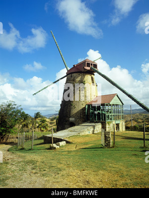 Old windmill which was used for crushing sugar cane on the east coast of Barbados Stock Photo