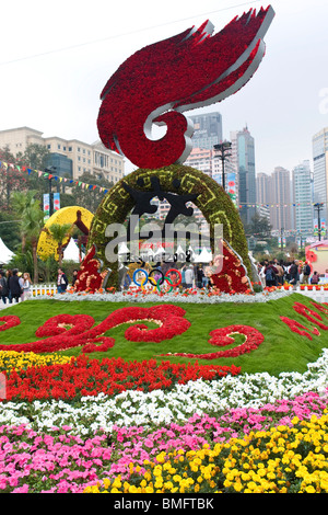 Logo of Beijing Olympic 2008 Torch Relay made of flowers, Victoria Park, Hong Kong, China Stock Photo