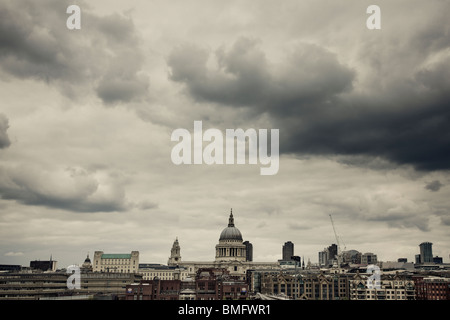 Panoramic view of  London skyline including St Pauls cathedral taken from Tate Modern art gallery under a black stormy sky 2010 Stock Photo