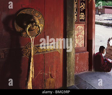 Massive copper handle on the gate of Dege Sutra Printing House, Garze Tibetan Autonomous Prefecture, Sichuan Province, China Stock Photo