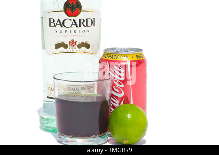Bottle Of Bacardi White Rum A Glass And Can Of Coca Cola And A Lime Isolated Against A White Background Stock Photo