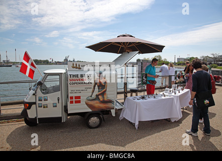 Tri-car souvenir stall at Langelinie in the port of Copenhagen selling miniatures of The Little Mermaid. Stock Photo