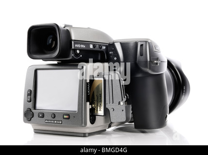 Compact flash memory card in a CF slot of a medium format digital camera Hasselblad H3DII-39. Isolated on white background. Stock Photo