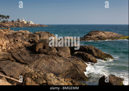 India, Kerala, Kovalam, Vizhinjam village mosques across the bay from lighhouse Stock Photo