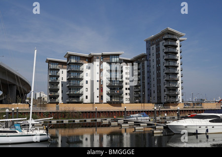 Riverside residential housing development in Cardiff Bay Wales UK. modern flats apartments, waterfront living Stock Photo
