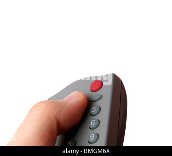 Remote control in a man hand. Isolated on white background. Stock Photo