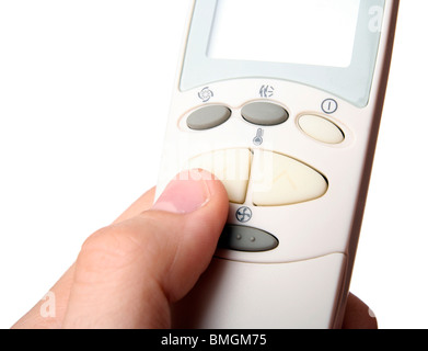 Remote control in a man hand. Isolated on white background. Stock Photo
