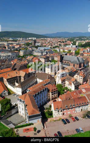 Overview of old town, viewed from citadel; the white building is the Town hall. Belfort. Franche-Comte. France. Stock Photo