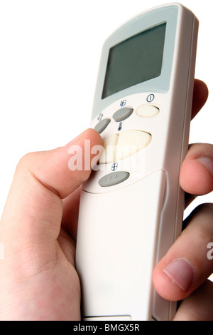 Remote control in a man hand. Isolated on white background. Stock Photo