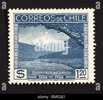 Postage stamp from Chile depicting the volcano at Puntiagudo. Stock Photo