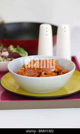 Fresh Spicy Cajun Chicken and Chorizo Sausage Jambalaya Served In A Bowl with No People Stock Photo