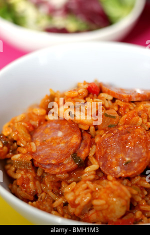 Fresh Spicy Cajun Chicken and Chorizo Sausage Jambalaya Served In A Bowl with No People Stock Photo