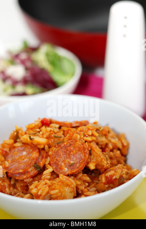 Fresh Spicy Cajun Chicken and Chorizo Sausage Jambalaya Served In A Bowl with No People Stock Photo