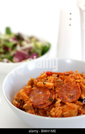 Fresh Spicy Cajun Chicken and Chorizo Sausage Jambalaya Served In A Bowl with No People Stock Photo