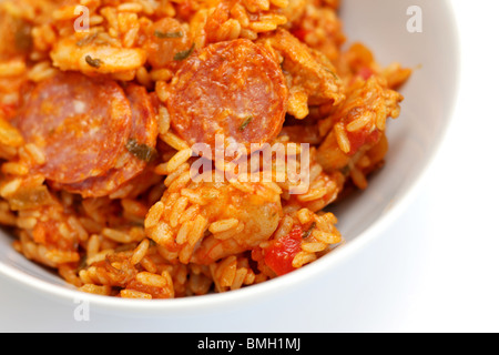 Fresh Spicy Cajun Chicken and Chorizo Sausage Jambalaya Served In A Bowl with No People Stock Photo