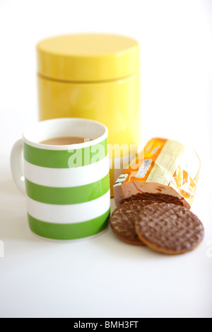 Mug of Tea and Milk Chocolate Hob Nob Biscuits Stock Photo