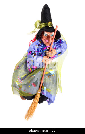 Witch on the broom isolated on white Stock Photo