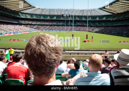 A rugby fan at Allianz Stadium, Twickenham home of English International rugby, in south west London, UK (stadium out of focus) Stock Photo