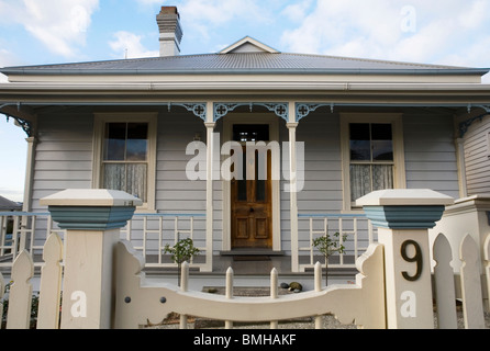 Classic wooden house and fence, Auckland, New Zealand Stock Photo