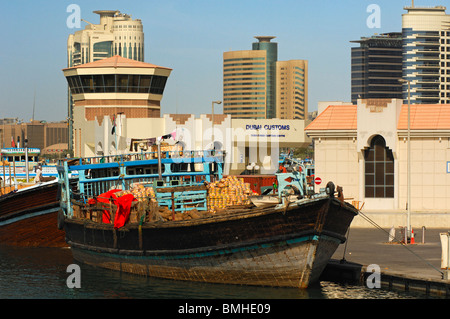 Dhow vessel with goods moored at the Dubai customs, Dubai, United Arab Emirates Stock Photo