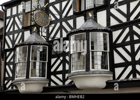 The Angel detail of bay windows on a black & white wattle & daub half timbered building on Broad Street Ludlow Shropshire UK Stock Photo