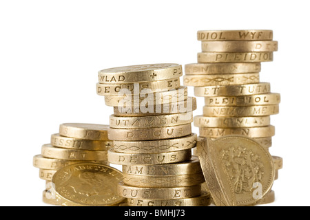 Wobbly piles of uk sterling pound coins Stock Photo