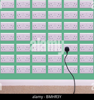 Wall covered in electrical outlets Stock Photo