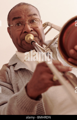 Man playing the trombone Stock Photo