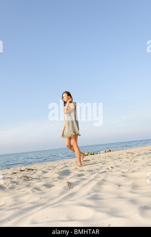 Young woman, 20+, on a beach, fun, lifestyle, pleasure, ease, Niendorf on the Baltic Sea, Schleswig-Holstein, Germany, Europe