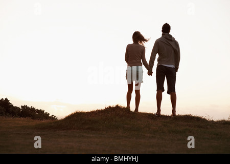 Couple holding hands Stock Photo