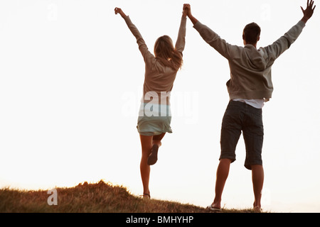 Couple holding hands Stock Photo