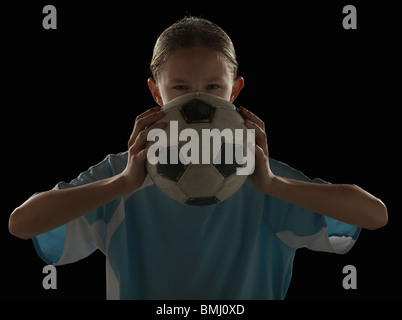 Soccer player and ball Stock Photo