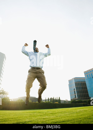 Businessman jumping Stock Photo