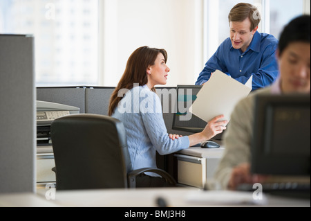 Office workers in cubicles Stock Photo