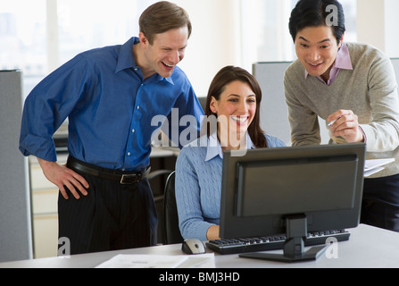 Office workers in cubicle Stock Photo