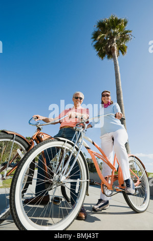 Couple riding bicycles Stock Photo