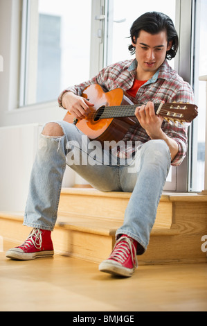 Man playing guitar Stock Photo
