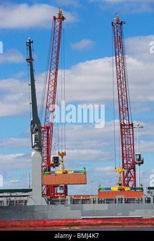 Cranes on cargo ship Stock Photo