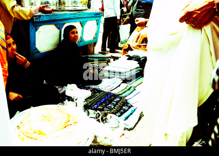 cross processed image , souk goma (friday market), street market, Southern Cemeteries, Khalifa district ,cairo,egypt Stock Photo