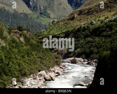 The Rio Urubamba valley heading up to Aguas Calientes and the ancient Inca ruins of Machu Picchu near Cusco in Peru Stock Photo